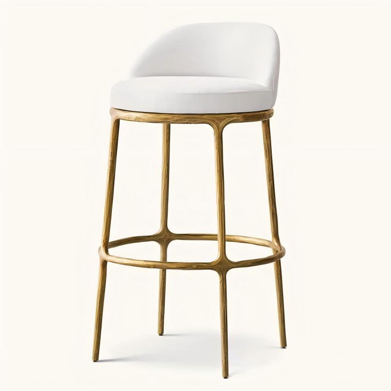 Artisan forged textured frame bar chair, high‑end upholstered bar stool, dark bronze metal frame beige suede cushion, hotel lobby commercial bar seating