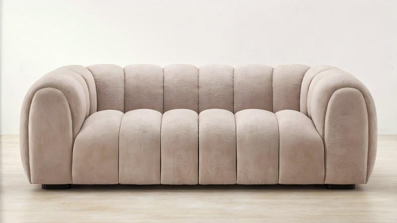 wabi-sabi cream sofa with rounded pumpkin cloud design and textured teddy fabric